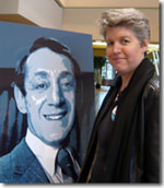 Patricia Loughrey with a photo of Harvey Milk